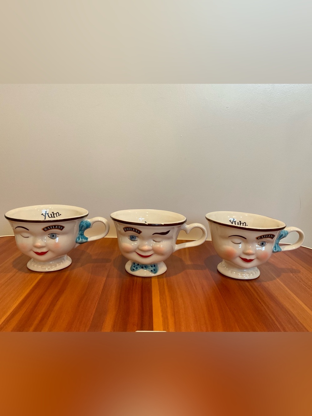 Whimsical Winking Ceramic Mug - Cream with Blue Accents